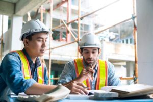 Two engineers having a discussion