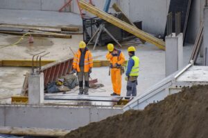 Workers constructing a commercial building.