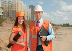 Contractors and engineers assessing the project site