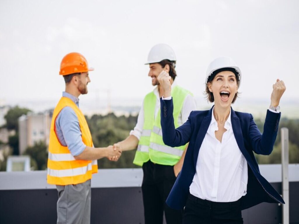 Businesswoman happy with a commercial building construction company