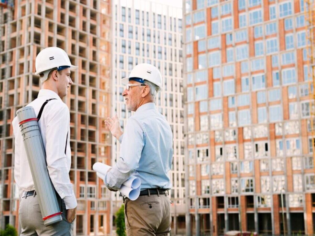 Businessman talking to a commercial building construction company