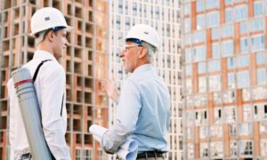 Businessman talking to a commercial building construction company