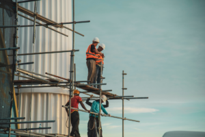 Several commercial builders working on a construction site 