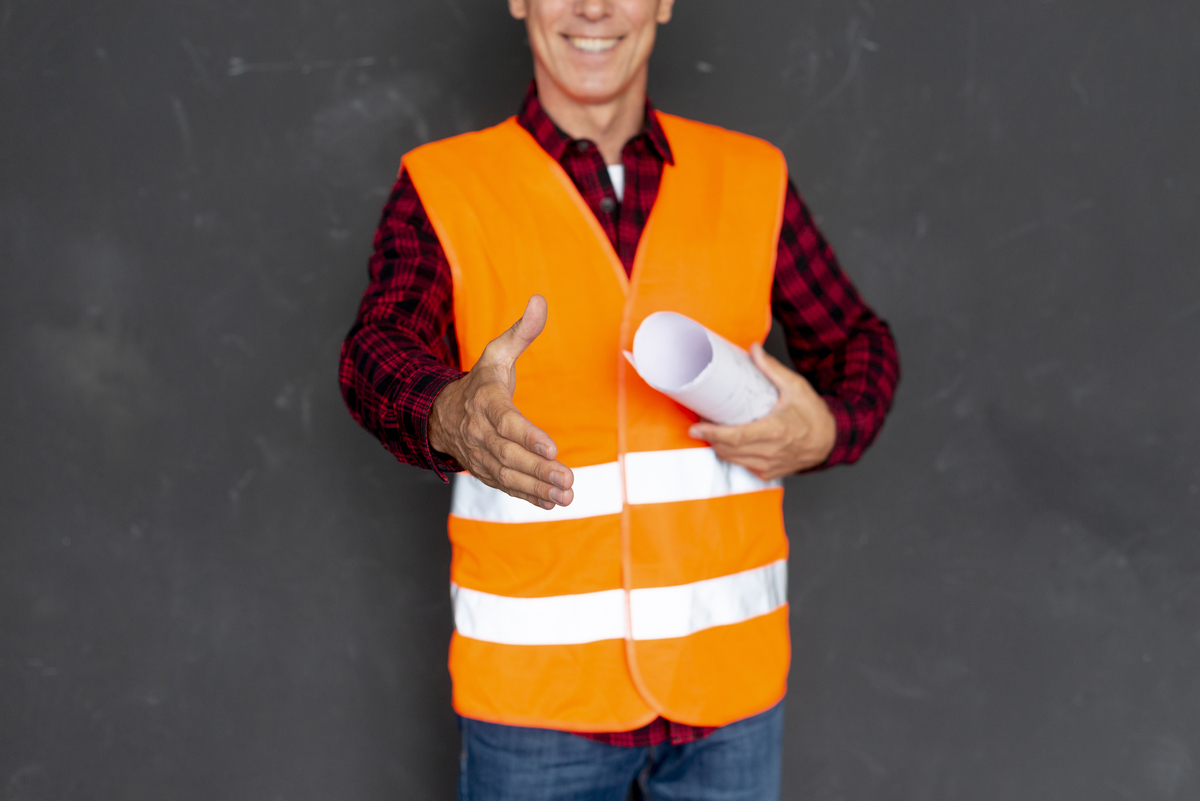 A man extending his hand for a handshake