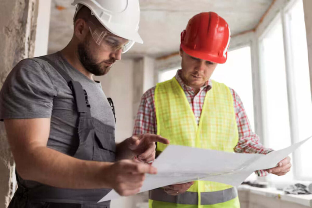 A contractor giving instructions to prevent business disruptions during a remodeling project